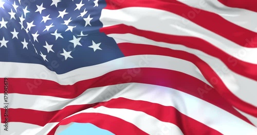 United States of American flag waving with blue sky, loop