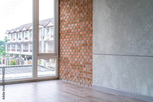 Interior loft design room with brick wall and cement polish