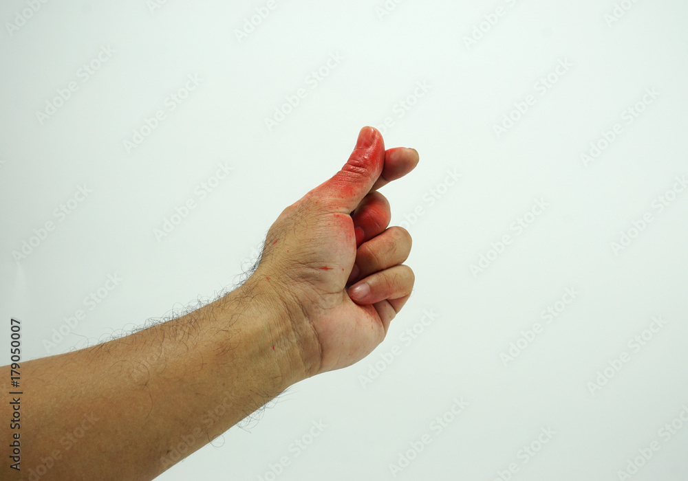 Mini hart posture of Men's hand stained with red color on white background Mini hart posture of Men's hand stained with red color on white background