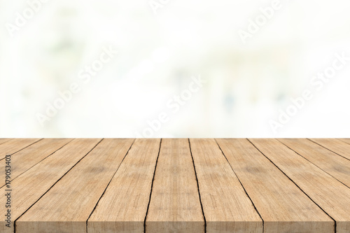 Empty wood table top on white blurred background,for montage your products