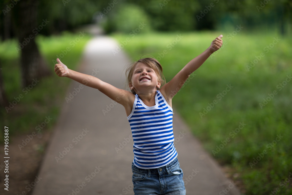 happy kid girl with Thumbs up, summer, outdoors,