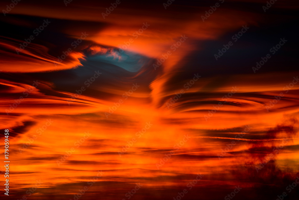 lenticular clouds at sunset
