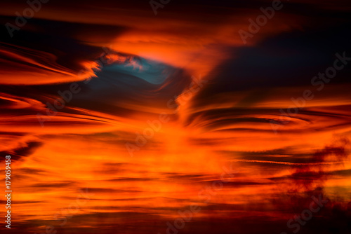lenticular clouds at sunset  