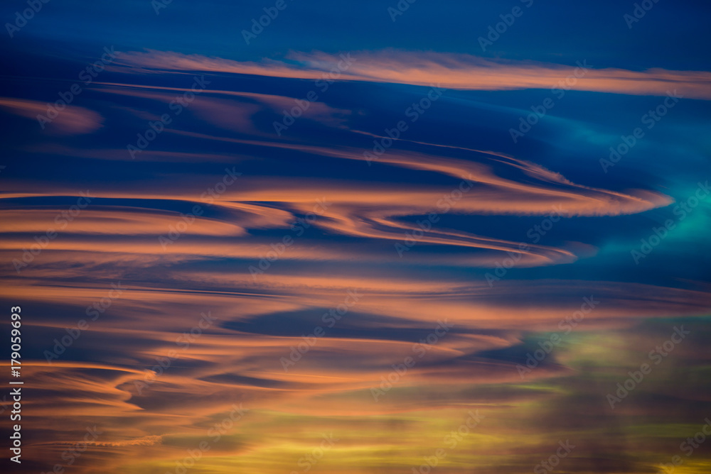 lenticular clouds at sunset
