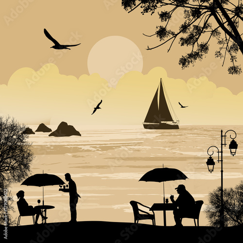 People silhouette on the beach and ship at the sea