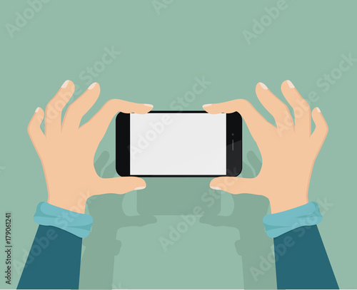 Man taking a picture with  smartphone