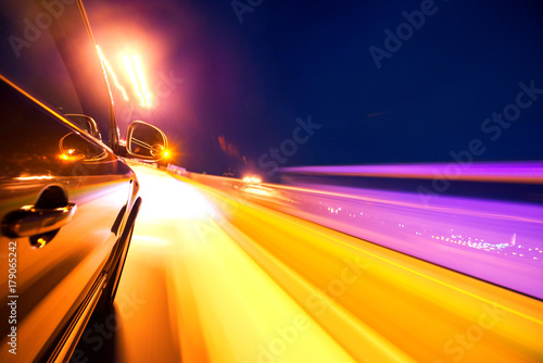 Car on the road with motion blur background.