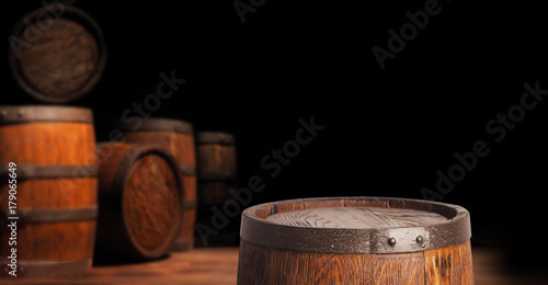 Rustic wooden barrel on a night background