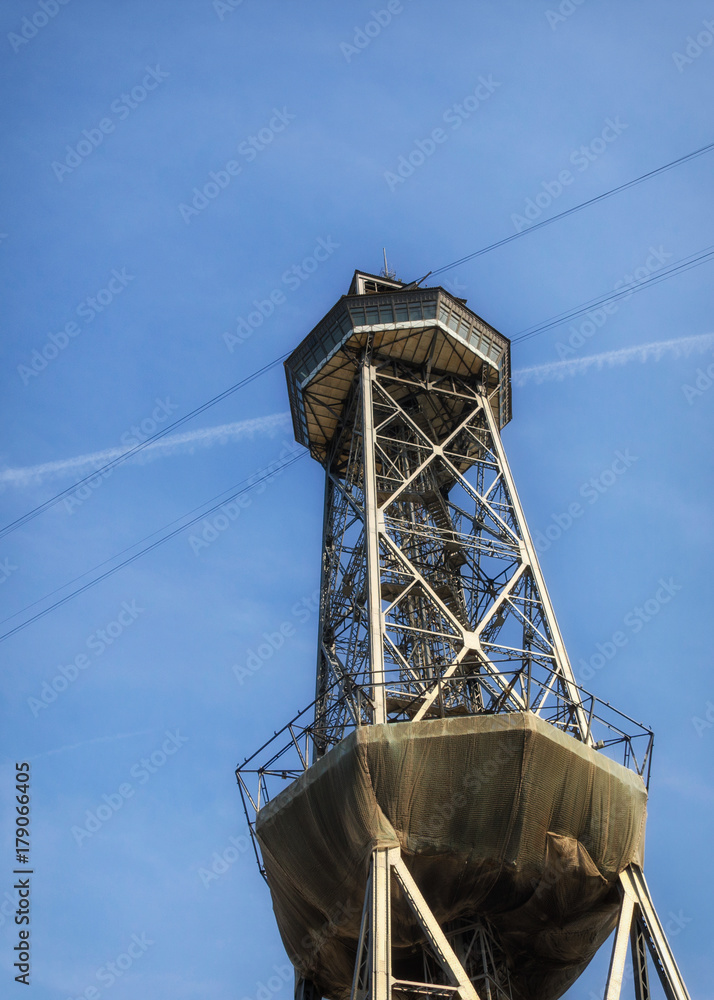 Torre Jaume of Port Vell Aerial Tramway in Barcelona, Catalonia, Spain. Funicular structure, view from bellow. Torre Jaume of Port Vell Aerial Tramway in Barcelona, Catalonia, Spain. Funicular structure, view from bellow.