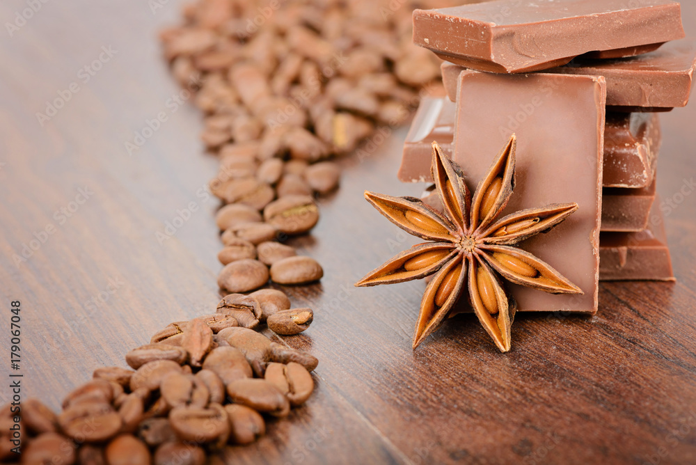 Coffee beans close up and chocolate Coffee beans close up and chocolate