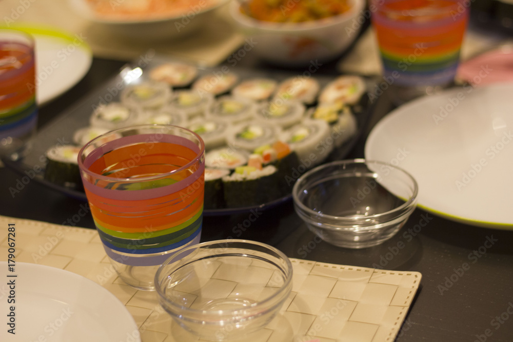 sushi colorful mix served dinner with wine, glasses, on table at restaurant, evening date, food photography sushi colorful mix served dinner with wine, glasses, on table at restaurant, evening date, food photography