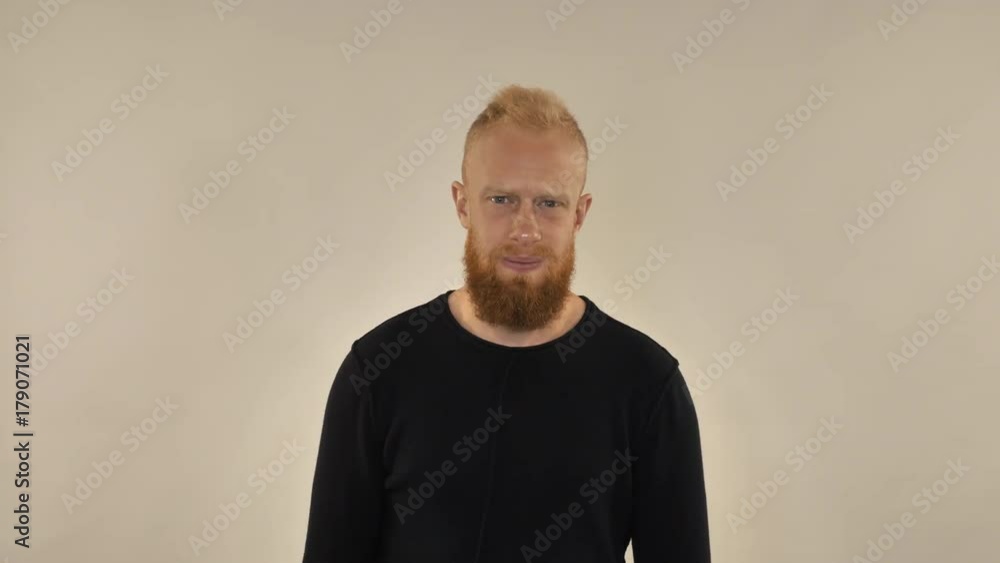 handsome hipster man showing emotion irritation. Redhead guy showing hand gesture fuck off. Annoy person portrait wearing in casual clothes. handsome hipster man showing emotion irritation. Redhead guy showing hand gesture fuck off. Annoy person portrait wearing in casual clothes.