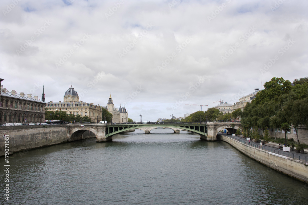 View landscape of Paris city at riverside of Seine river with traffic road