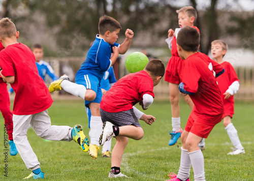 Young children players football match on soccer field © Dusan Kostic
