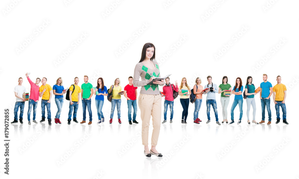 Large group of teenage students isolated on white background. Many different people standing together. School, education, college, university concept. Large group of teenage students isolated on white background. Many different people standing together. School, education, college, university concept.