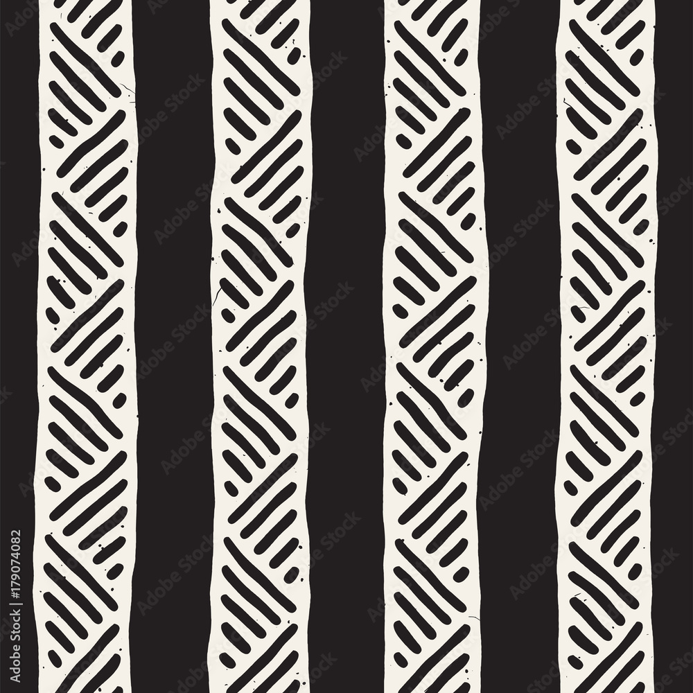 Hand drawn style ethnic seamless pattern. Abstract geometric tiling background in black and white. Hand drawn style ethnic seamless pattern. Abstract geometric tiling background in black and white.