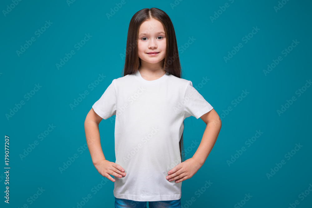 Cute girl in tee shirt with long hair Cute girl in tee shirt with long hair