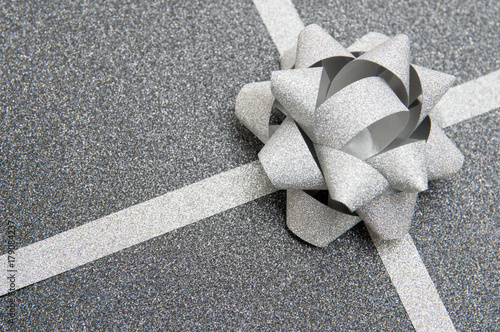 black gift box with silver ribbon