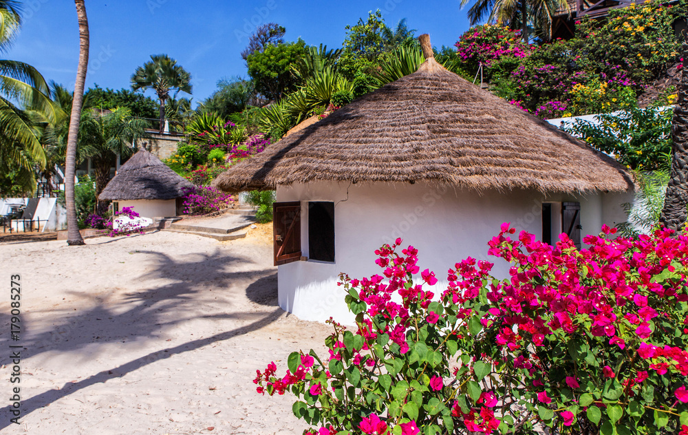 West Africa Senegal Cap Skirring - bungalow in an exclusive hotel for  tourists Stock Photo | Adobe Stock