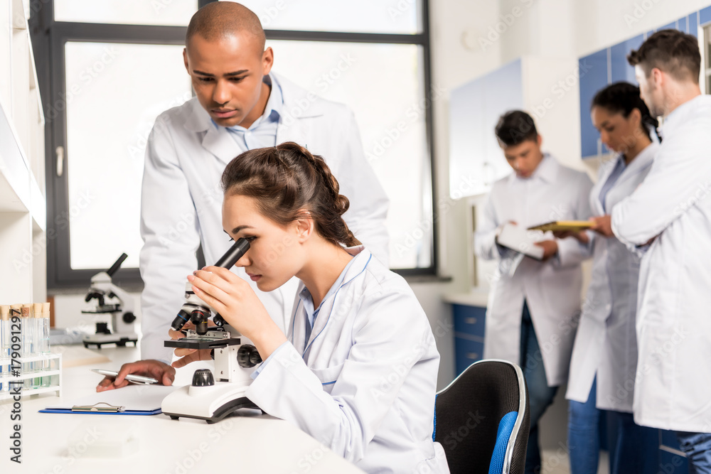 Fototapeta premium Female scientist at laboratory