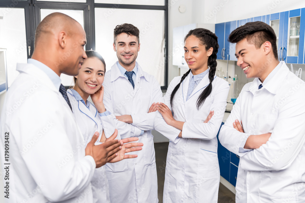 young doctors discussing work young doctors discussing work