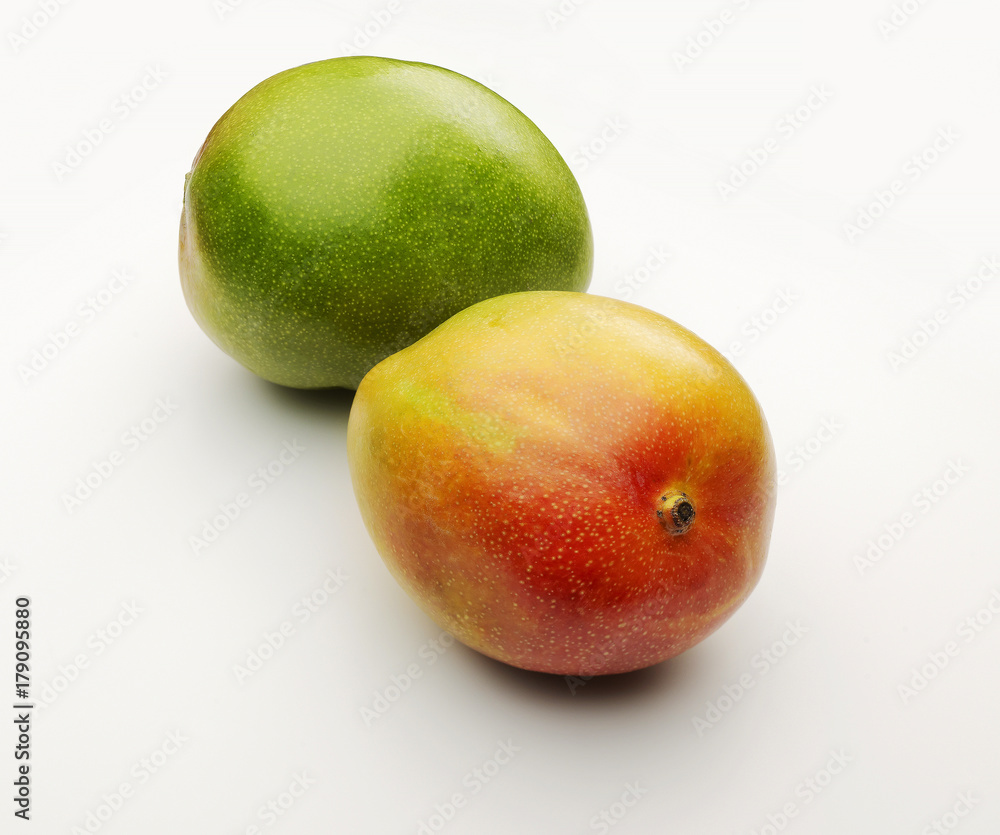 two ripe mango fruits isolated on white two ripe mango fruits isolated on white