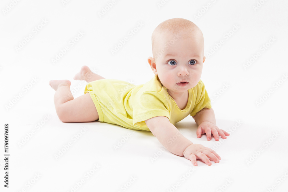 cute baby lying on the background and smiling cute baby lying on the background and smiling