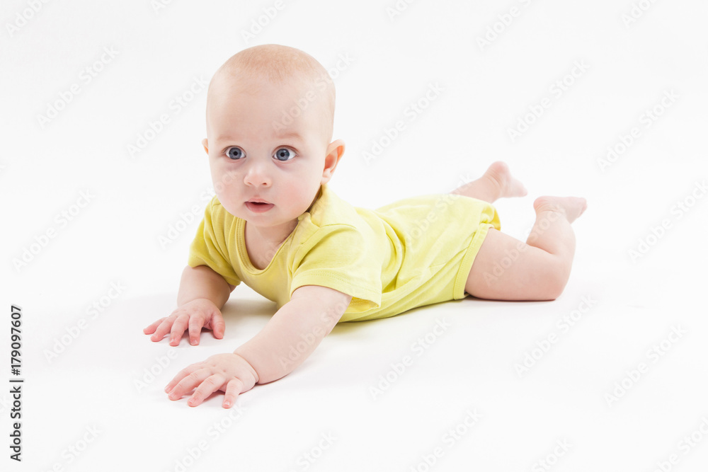 cute baby lying on the background and smiling cute baby lying on the background and smiling