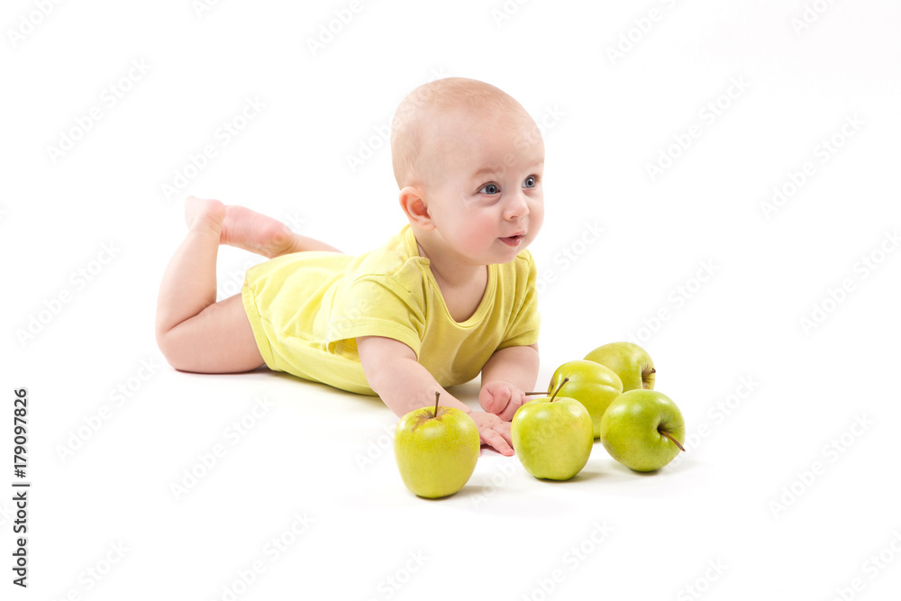 smiling baby lying on the background to include apples smiling baby lying on the background to include apples