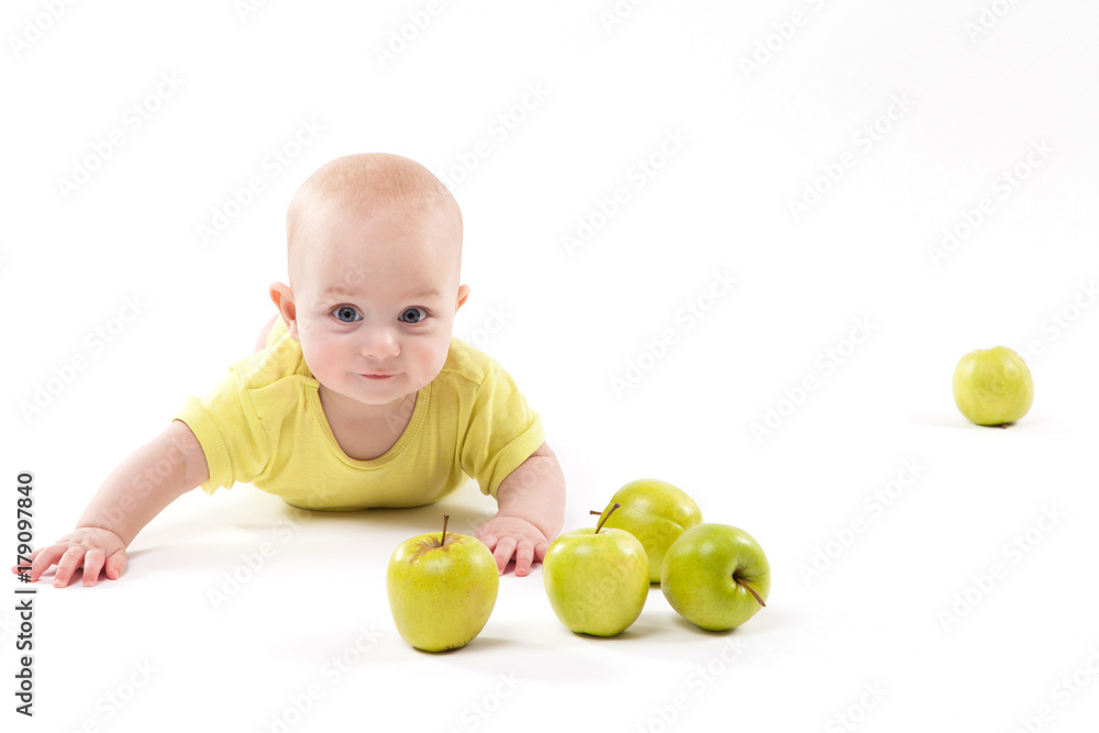 smiling baby lying on the background to include apples smiling baby lying on the background to include apples