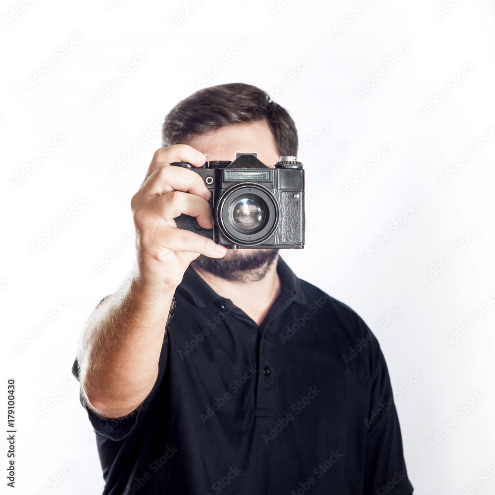 Man hold in front of him old retro vintage soviet camera Man hold in front of him old retro vintage soviet camera