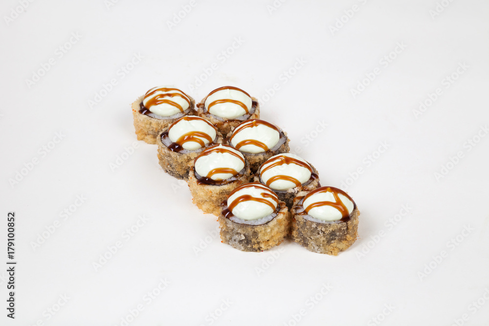 Japanese food Sushi rolls with fish on a white background Japanese food Sushi rolls with fish on a white background