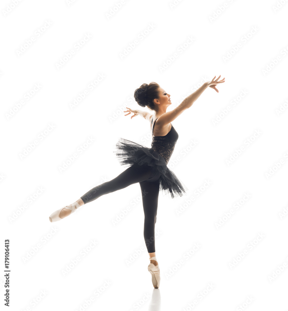 Young beautiful ballet dancer isolated over white background
