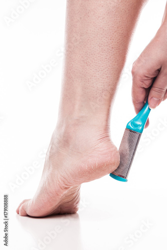 care for dry skin on the well-groomed feet and heels with the help of tools pedicure graters Foot
