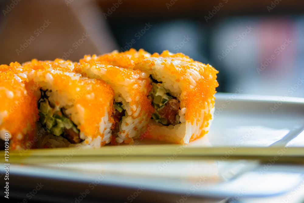 Close up tasty Japanese rolls on plate Close up tasty Japanese rolls on plate