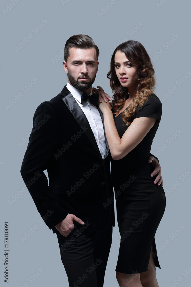 Business partners standing on a gray background