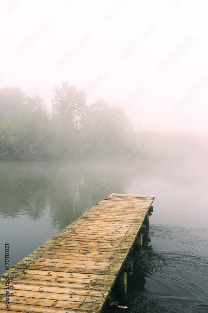 Wooden floating dock on river Ardas, Greece Wooden floating dock on river Ardas, Greece