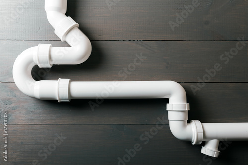 white plastic sewerage water pipes photo