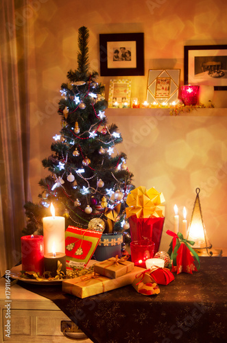 Beautifully decorated house with a tree and presents at Christmas