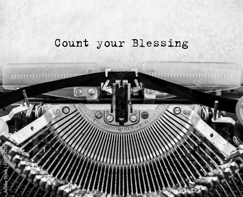 Vintage typewriter with text Count your Blessing.