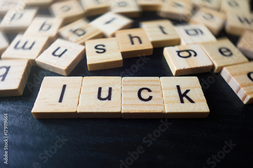 Luck word from wood cube letters 