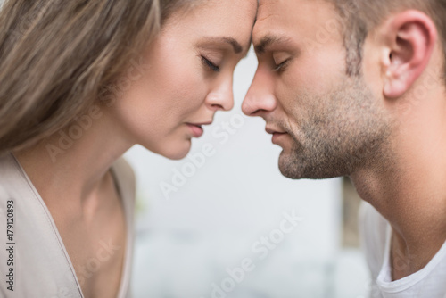 couple touching foreheads