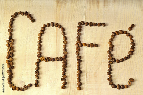 coffee beans  writing  the word cafe in  spanish languaje photo