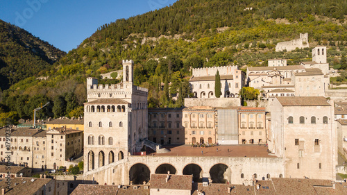 Gubbio, Italy. One of the most beautiful small town in Italy. Drone aerial view of the city center, main square and the historical building called Palazzo dei Consoli