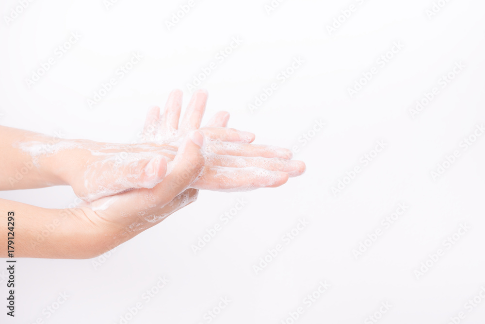 Asian girl hands are washing with soap bubbles on white background Asian girl hands are washing with soap bubbles on white background
