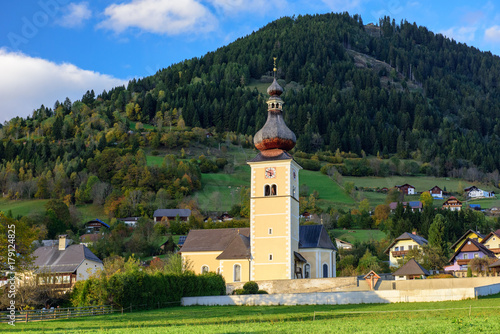St. John's Church in the alpine village Obermillstatt, situated within the Gurktal Alps (Nock Mountains). State of Carinthia, Austria. photo