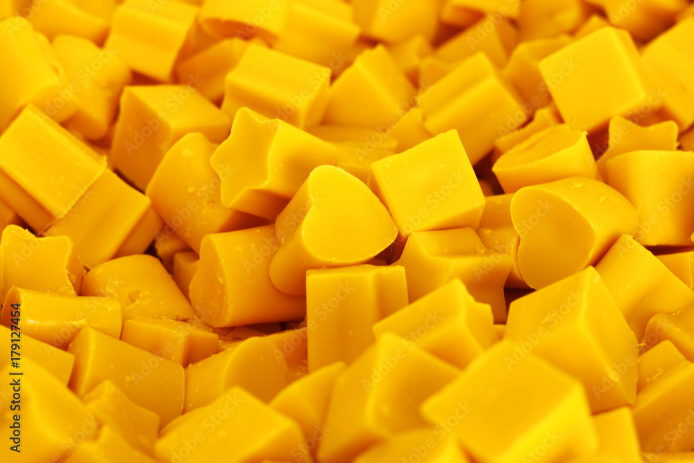 Candles shape heart and stars closeup blur background Candles shape heart and stars closeup blur background