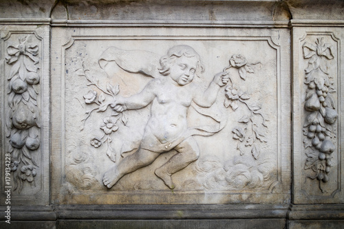 Ornaments, moldings, gargoyle, low reliefs in a sandstone, granite, concrete. sculpting details in Gdansk (Danzig).  Mariacka street (Mariengasse). photo