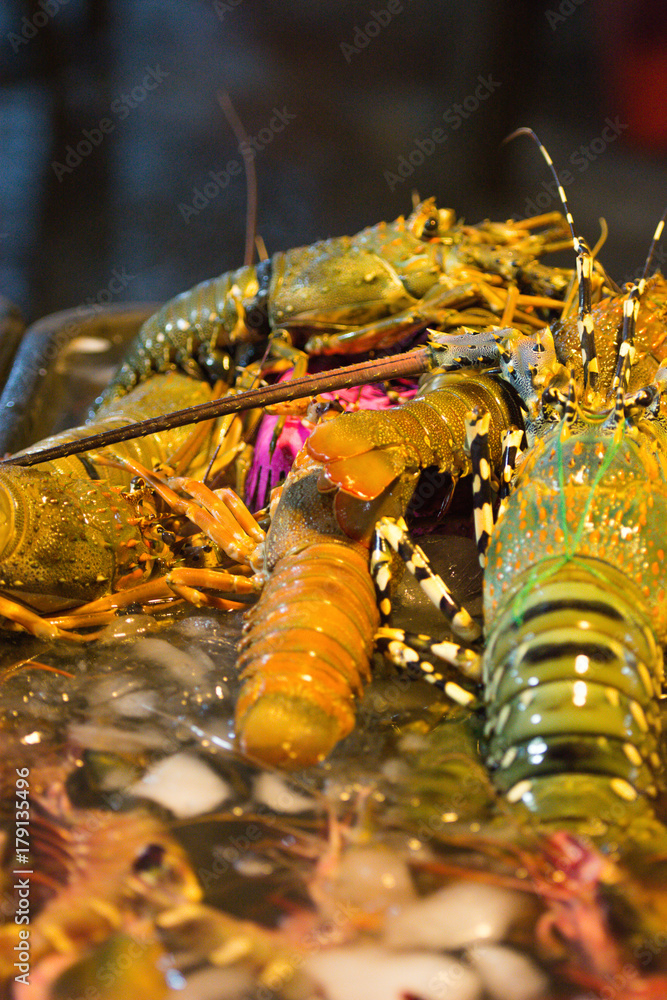 Variety of fresh salted water prawn and lobster on sale at seafood