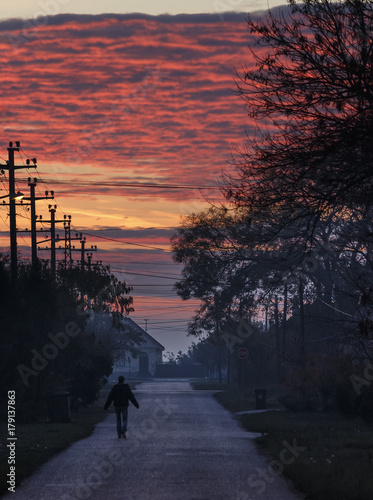 Red morning on the village street